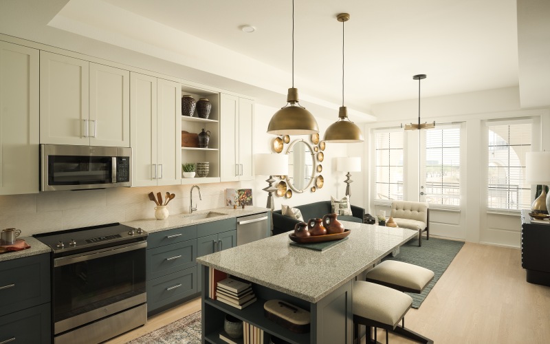 a kitchen with white cabinets