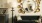 A room with sofa and wall decor