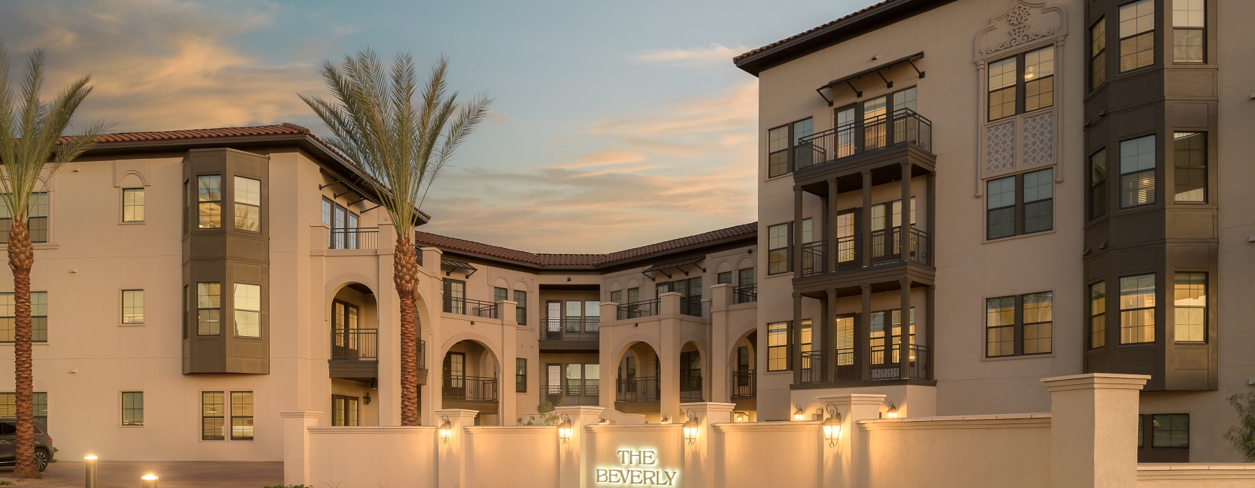 a building with palm trees