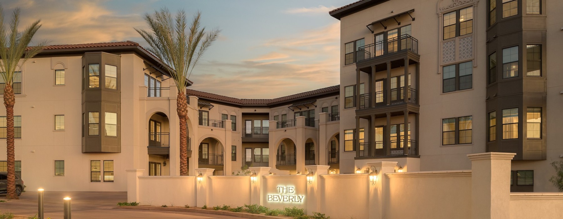a building with palm trees